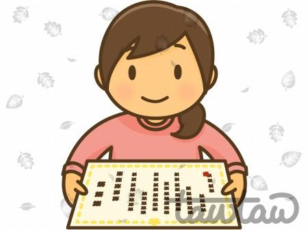 賞状を受け取りはにかんだ顔の子ども